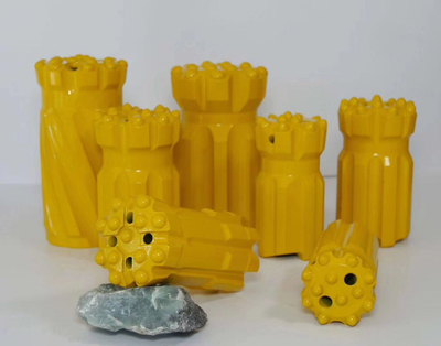 Top hammer rock drilling tools button bits