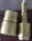 Overburden Eccentric drill tools with casing tube and Symmetrix Concentric DTH drilling tools